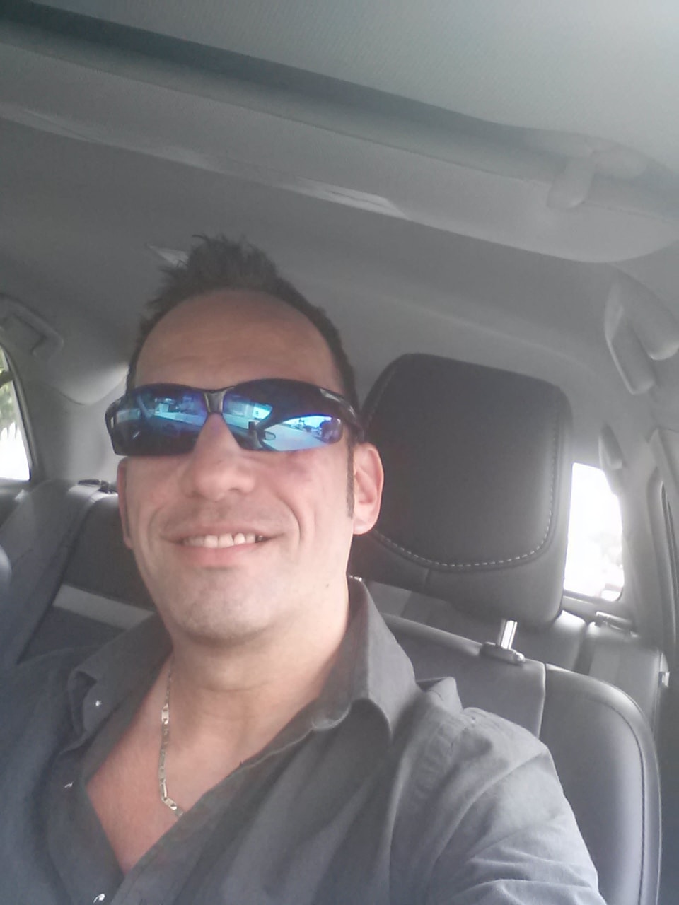 Christian — car selfie with sunglasses